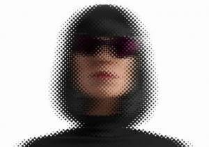 A head shot of a woman made up of dots to represent gray component replacement for ink optimization